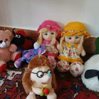 عروسک و خرس اسباب بازی