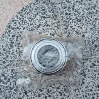 تعدادی وسایل ماشین درب پژو باتری نو و بلبرینگ|قطعات یدکی و لوازم جانبی|شیراز, هفت تنان|دیوار