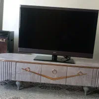 تلوزیون ۴۹ اینچ LG همراه با میز تلویزیون