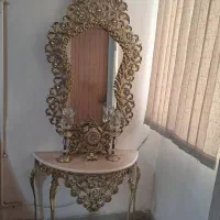 آیینه شمعدان. میز.ساعت .