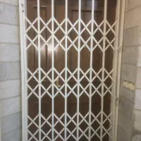 حفاظ آکاردئونی به همراه درب ورودی