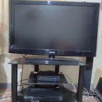 میز تلویزیون شیشه ای در حد نو