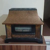 بخاری شومینه ای کاملا سالم کم کارکرده در حد نو