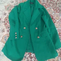 تعدادی مانتو و شلوار در حد