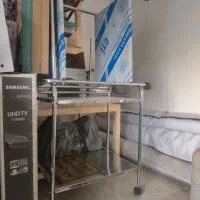 چهارپایه فلزی کنار تخت پزشکی