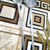 با سلام دو عدد کفگیر و ملاقه مسی قدیمی سنگین وزن