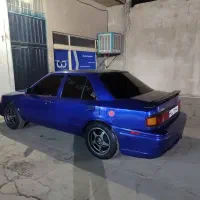 کلاسیک مزدا ۳۲۳ تقویت|خودرو کلاسیک|تهران, آسمان|دیوار