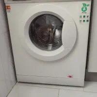 یک دستگاه لباس شویی ابسال