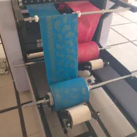 دستگاه رول کن سفره یکبار مصرف دو رول همزمان