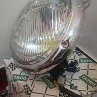 یک عدد چراغ جلو کامیون بنز