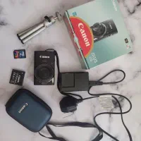 دوربین عکاسی کنن ایکسوز ۱۵۵ با جعبه و لوازم کامل