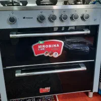 اجاق گاز روبینو صفحه شیشه ای در حد نو