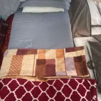 تشک و بالش و پتو و ملحفه در حدنو