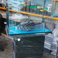 آکواریوم شیشه خم شرکتی دلساوآکوا باارسال|ماهی|تهران, تولید دارو|دیوار