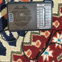 ۱عدد رادیو و ساعت شماره تماس