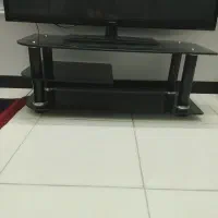میز تلویزیون شیشه ای