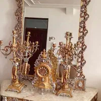 اینه  شمعدان