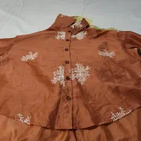 وردست برشکار پوشاک. وسط کار  و  اتو کار