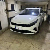 kia k3 نیم فول (جفت صندلی جلو برقی )