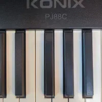 پیانو تاشو کونیکس مدل PJ88C،نو و با امکانات کامل|پیانو، کیبورد، آکاردئون|چالوس, |دیوار