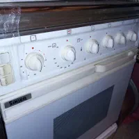 اجاق گاز ۴ شعله  فردار  وجوجه گردان  تمیز