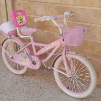 دوچرخه ۲۰ دخترانه صورتی در حد نو