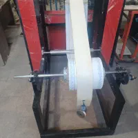 دستگاه دستمال پر کن و رورل سفره