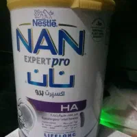 تعدادی قوطی خالی شیرخشک