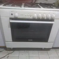 یک عدد یخچال فریزر قندیل و یک عدد گاز فردار سینجر