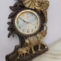 ساعت دیواری و شمعدان و...