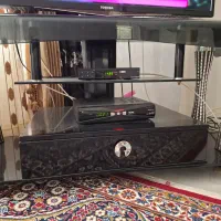 میز تلویزیون شیشه ای سه طبقه