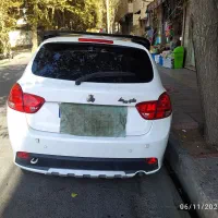 کوییک Rپلاس سفید مشکی مدل 402پارس خودرو