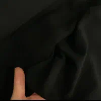 یک قواره چادر مشکی دوخت شده