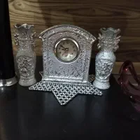 ساعت و شمعدانی