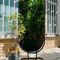 آینه کپسولی پایه دار و رگال آویز البسه