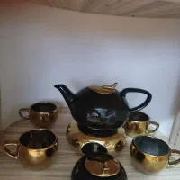 قوری وارمر دار با۴عددفنجان ویک عدد قندون