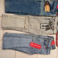 مقداری لباس نو شلوار زنانه پیراهن مردانه