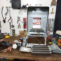 تعمیرات تخصصی انواع پکیج و کولر آبی و پمپ آب