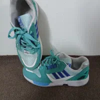 کفش|کیف، کفش، کمربند|اصفهان, باغ دریاچه|دیوار