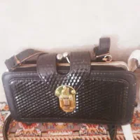 کفش|کیف، کفش، کمربند|تربت جام, حافظ|دیوار