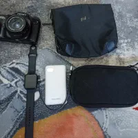 پاور بانک و کیف و دوربین اضل
