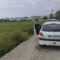زمین 200متر با قابلیت ساخت با ویو درختان کیوی