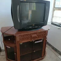تلویزیون LGبه همراه دیجیتال و میز چوبی