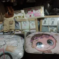 سیسمونی رختخواب لباس ظروف وکفش نوزاد