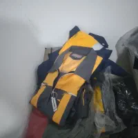 تعدادی لباس کار و کفش کار