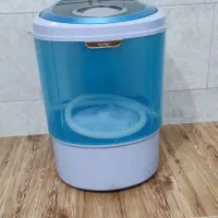 ماشین کهنه شور لباسشویی کودک