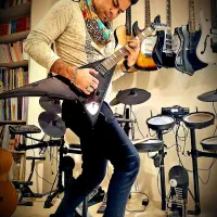 اموزش ویژه    گیتار   سنتور   تمپو   دف   هنگدرام