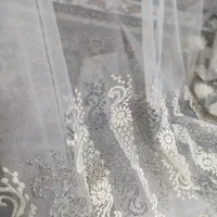 یک قواره پارچه پرده ای سفید طوسی