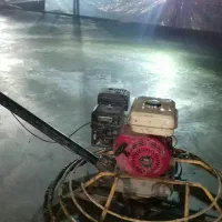 بتن ریزی کف با ماله پروانه ای ماله برقی