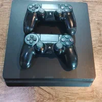 ps4 slim 1tb با دودسته اصلی و بازی قانونی